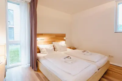 Ein Bett oder Betten in einem Zimmer der Unterkunft M2 Living Apartment No 2